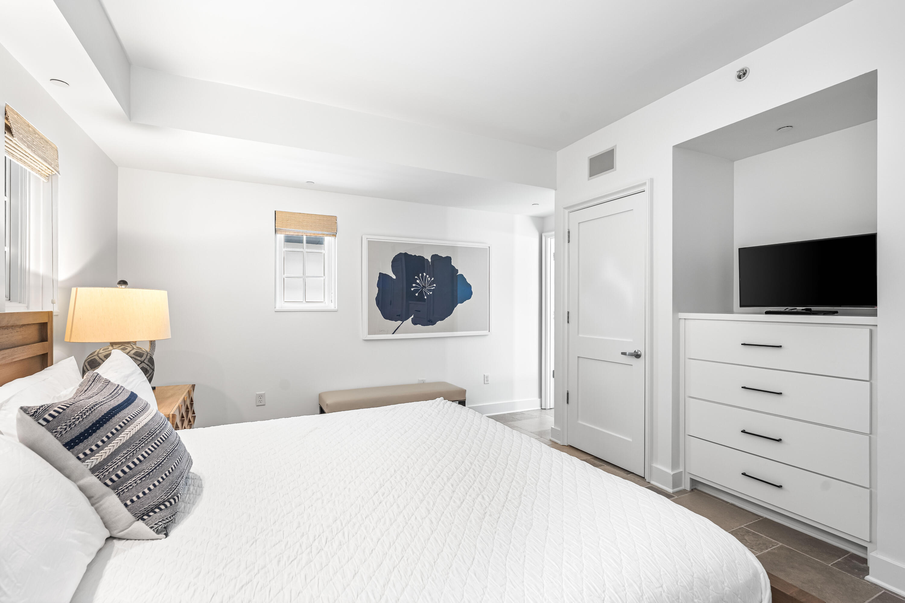 136 Georgetown Avenue, Unit 2D Inlet Beach, FL 32461 - Photo 20 of 48 a bedroom with a bed and a flat screen tv