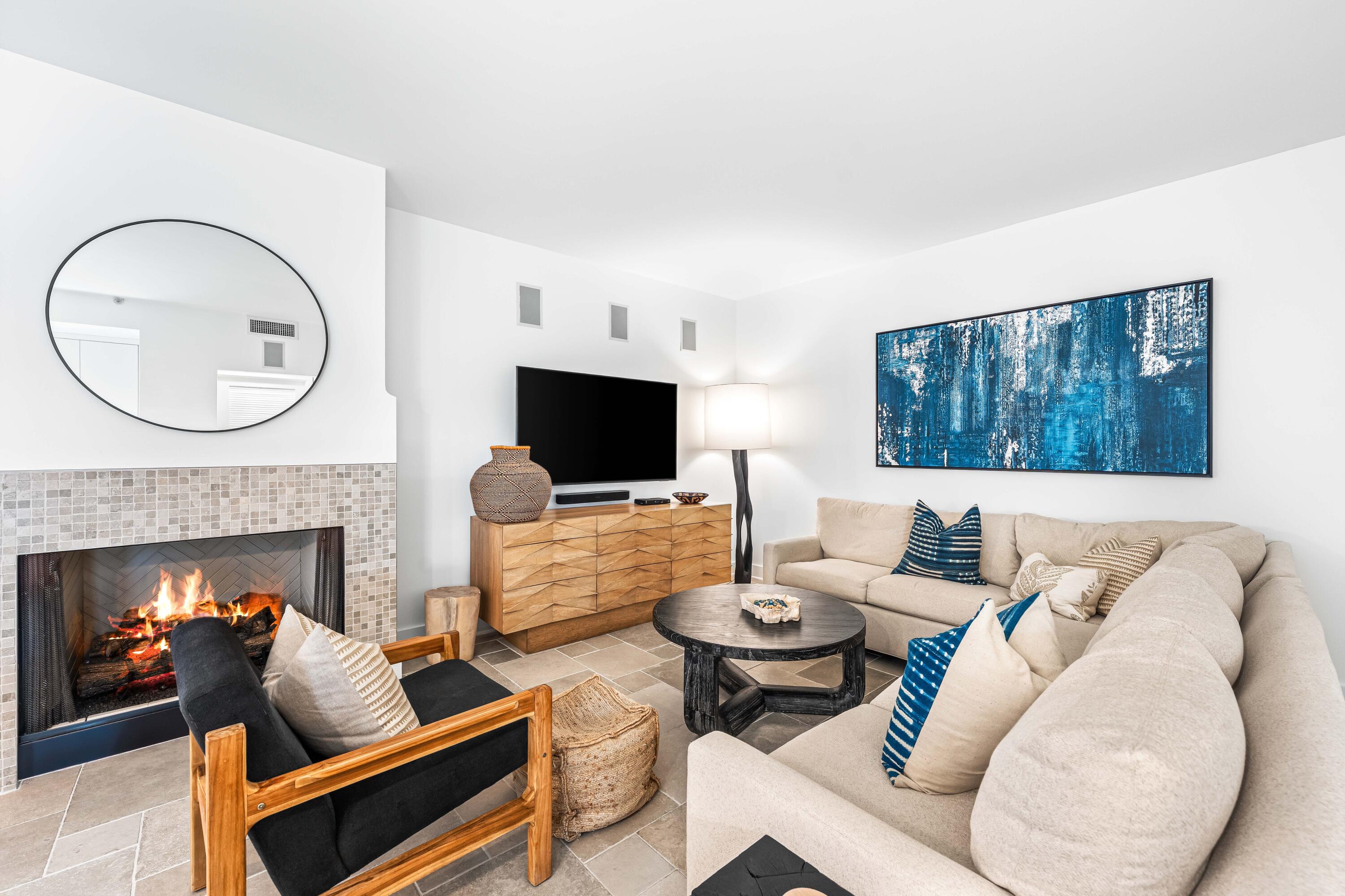 136 Georgetown Avenue, Unit 2D Inlet Beach, FL 32461 - Photo 2 of 48 a living room with furniture and a fireplace