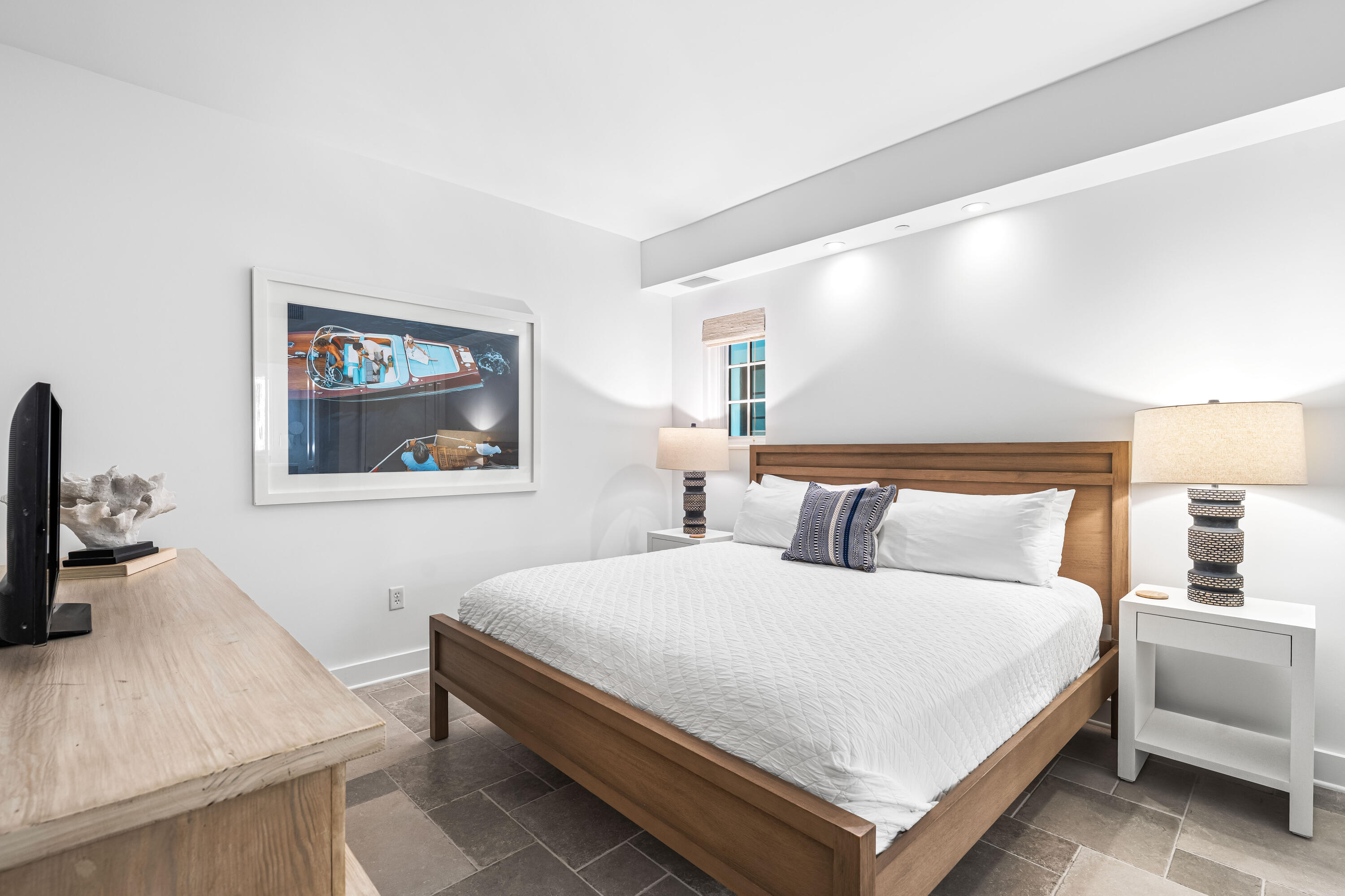 136 Georgetown Avenue, Unit 2D Inlet Beach, FL 32461 - Photo 26 of 48 a bedroom with a bed and a desk