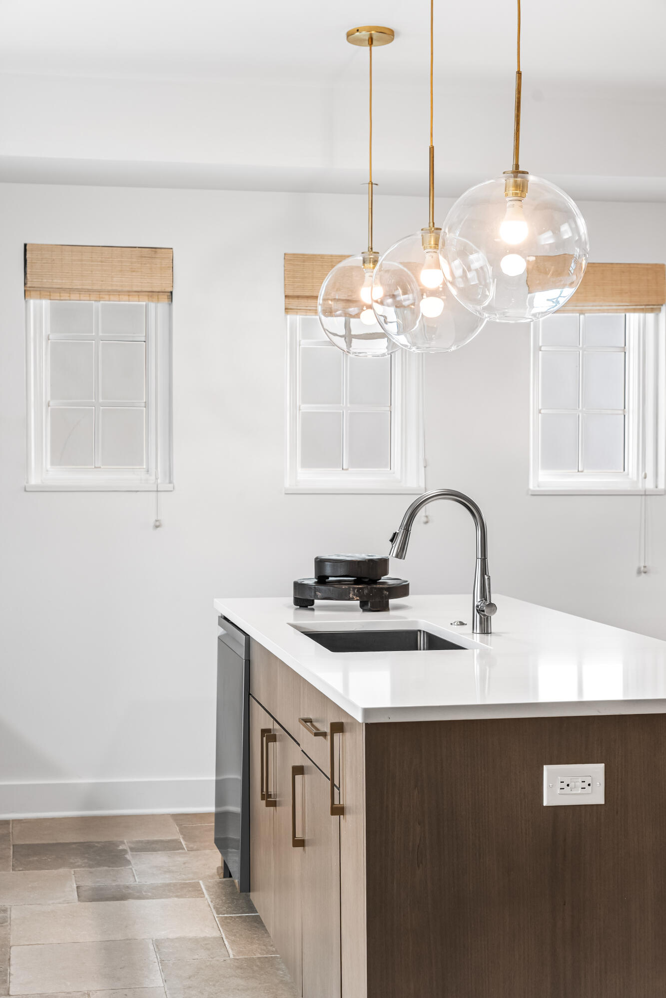136 Georgetown Avenue, Unit 2D Inlet Beach, FL 32461 - Photo 33 of 48 a kitchen with a sink a chandelier stainless steel appliances and cabinets