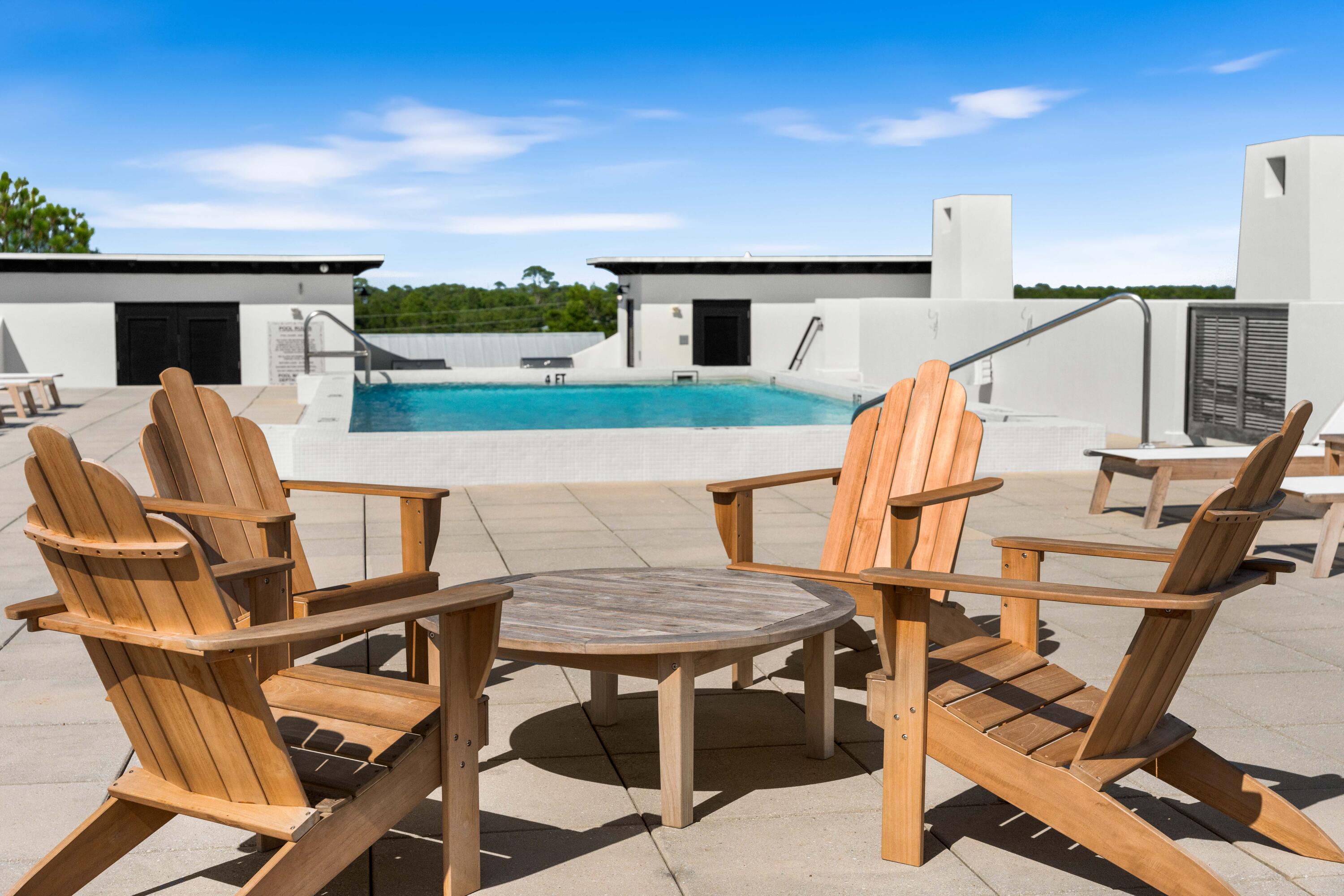 136 Georgetown Avenue, Unit 2D Inlet Beach, FL 32461 - Photo 42 of 48 a view of deck with table and chairs