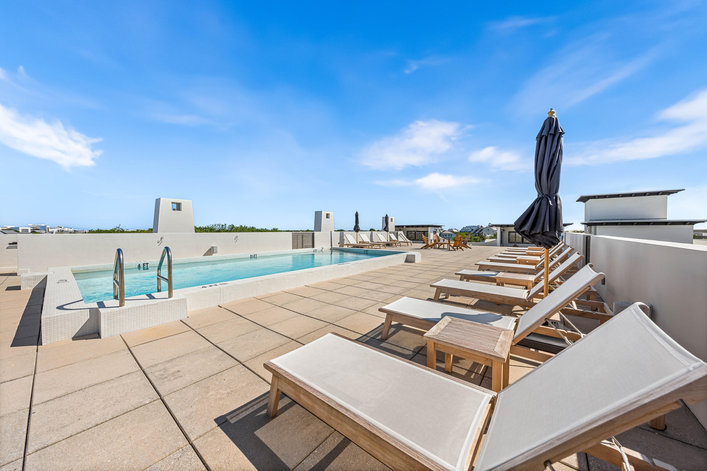 136 Georgetown Avenue, Unit 2D Inlet Beach, FL 32461 - Photo 45 of 48 a view of a terrace with chairs