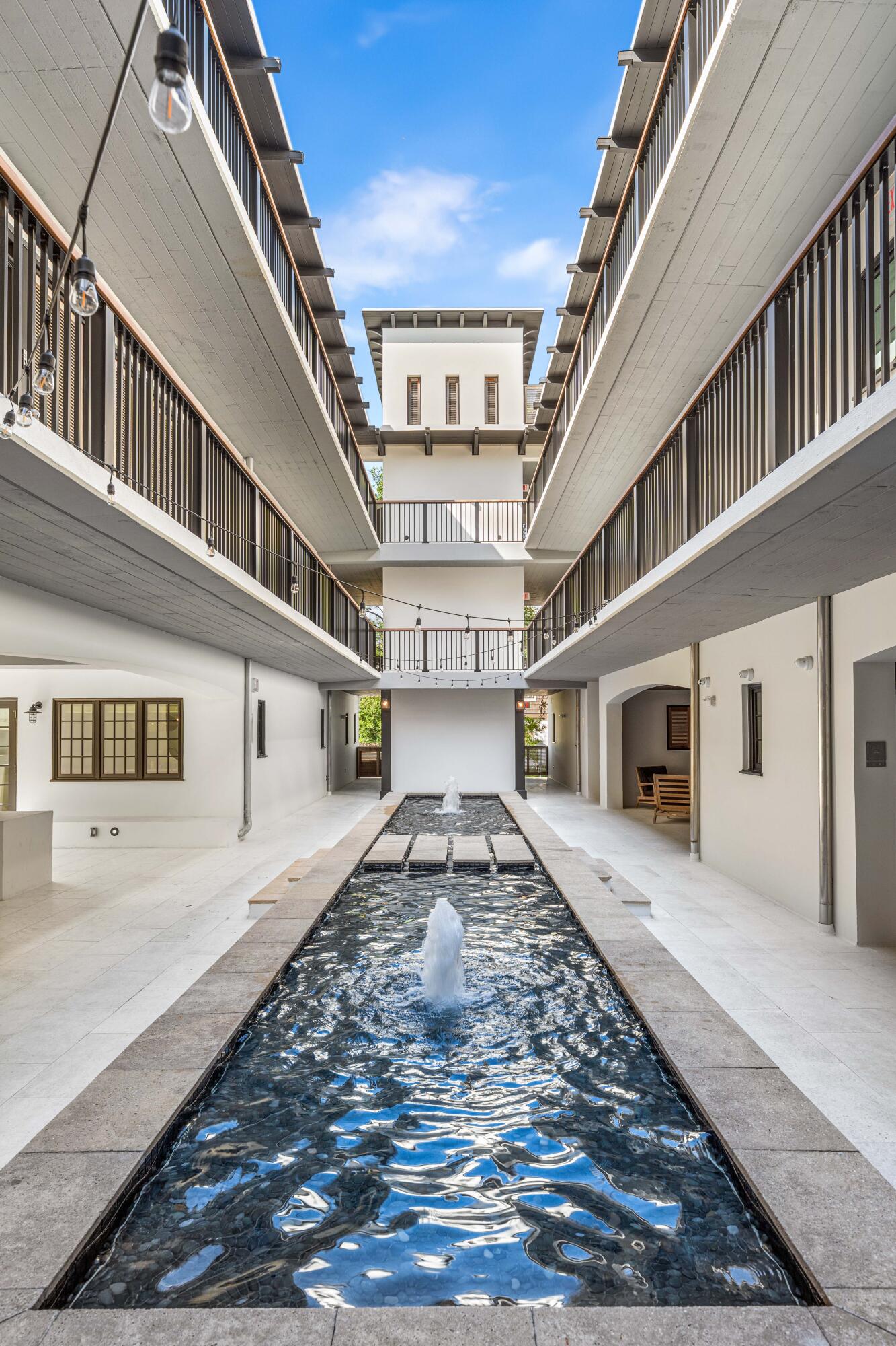 136 Georgetown Avenue, Unit 2D Inlet Beach, FL 32461 - Photo 46 of 48 a big room with wooden floors