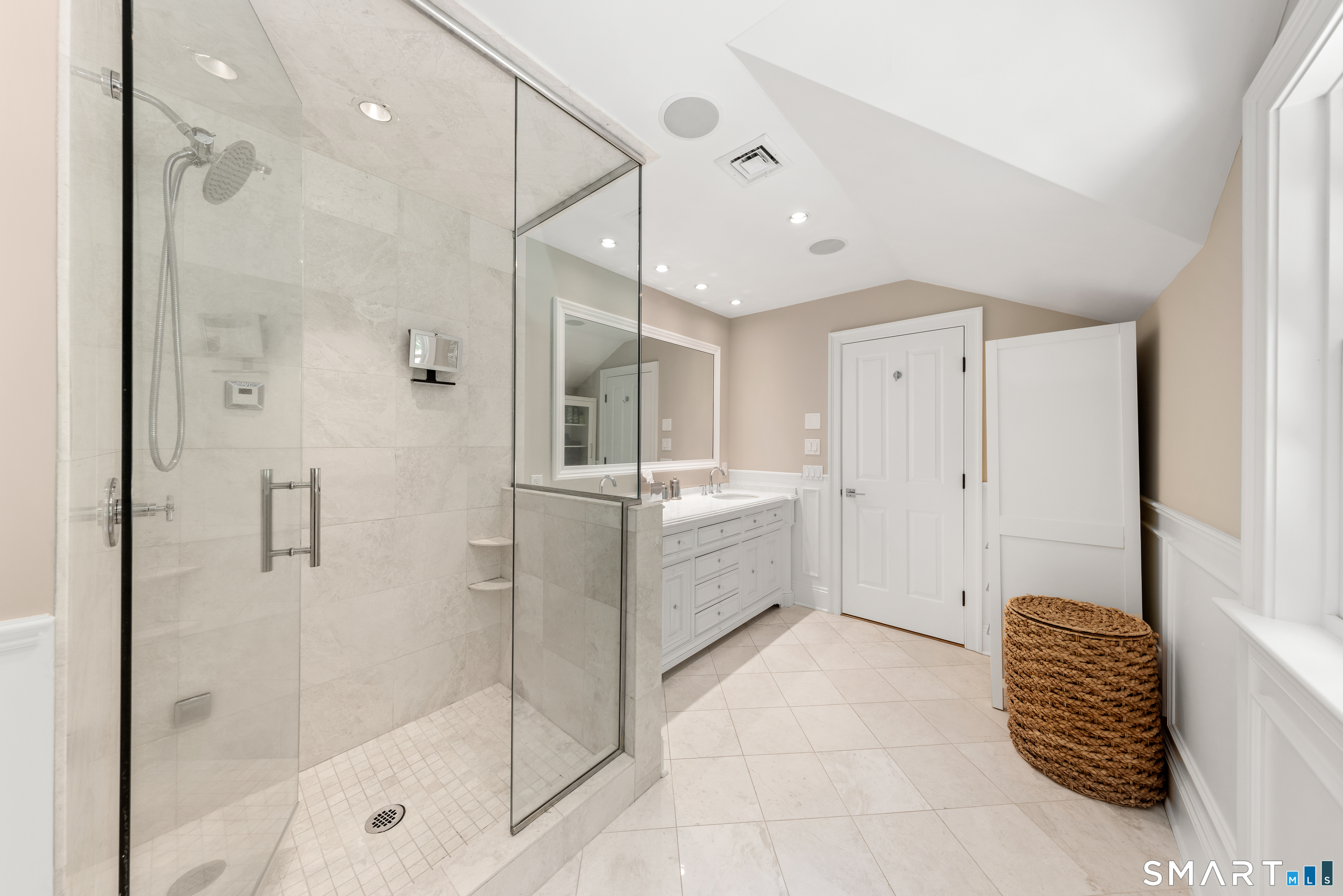 99 Hickok Road New Canaan, CT 06840 - Photo 20 of 39 a bathroom with a tub shower and mirror