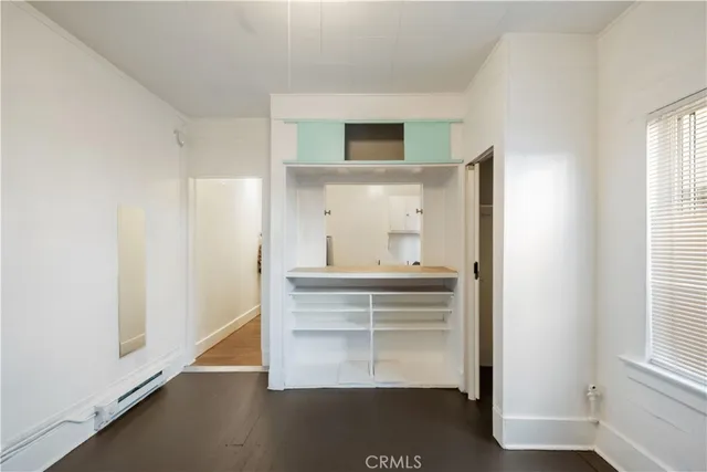 a view of cabinets and window