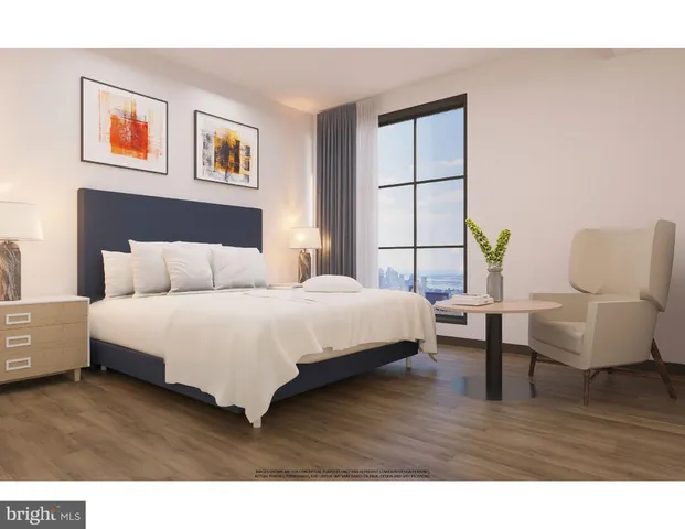 a bedroom with a bed a couch and a window