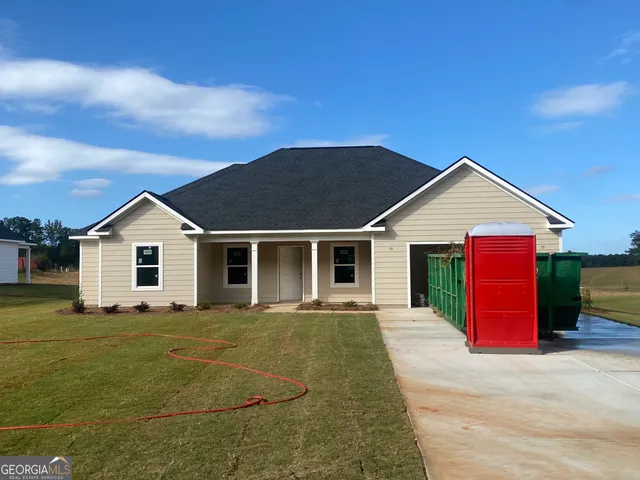 a view of a house with a patio