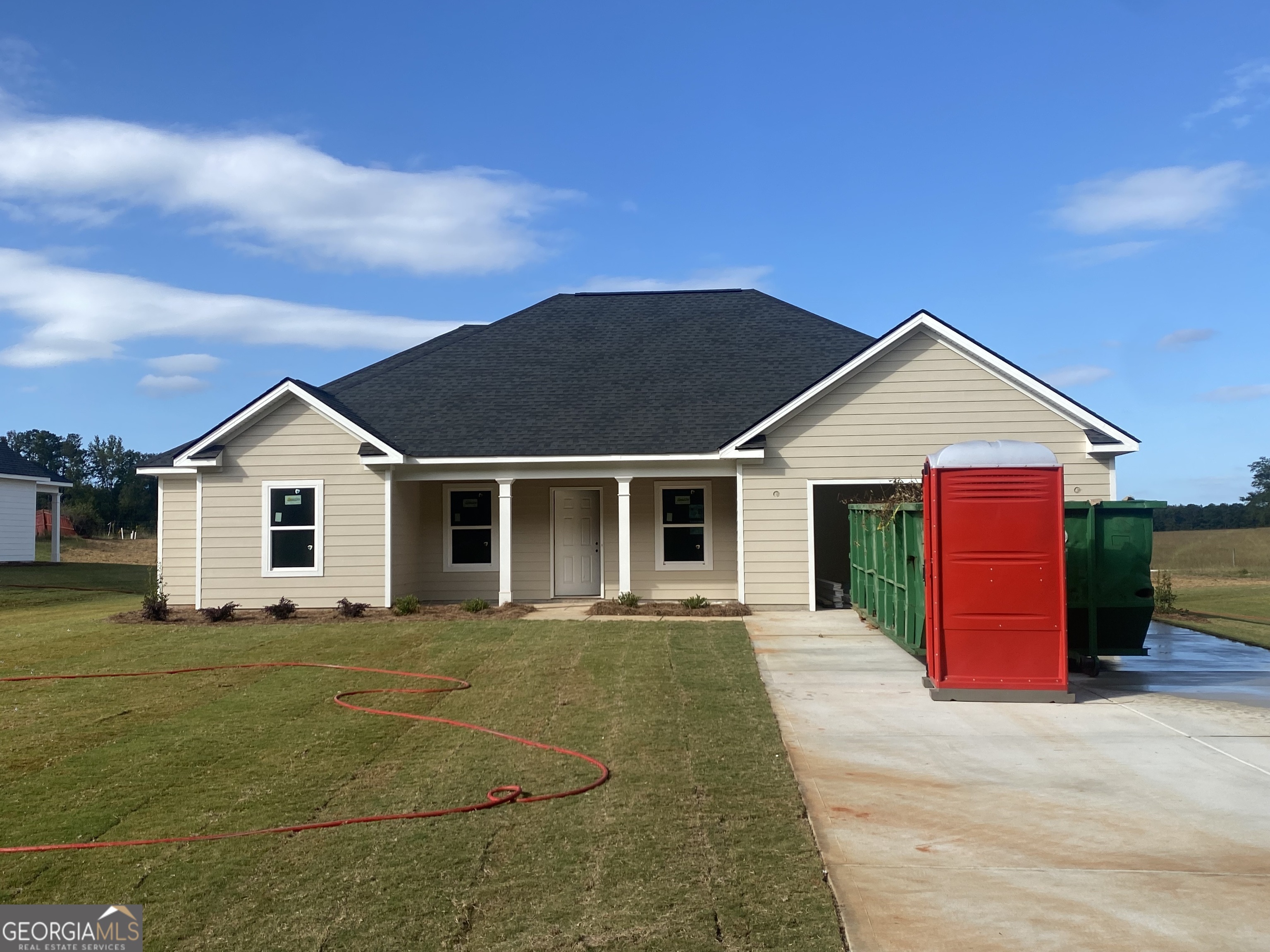 a view of a house with a patio