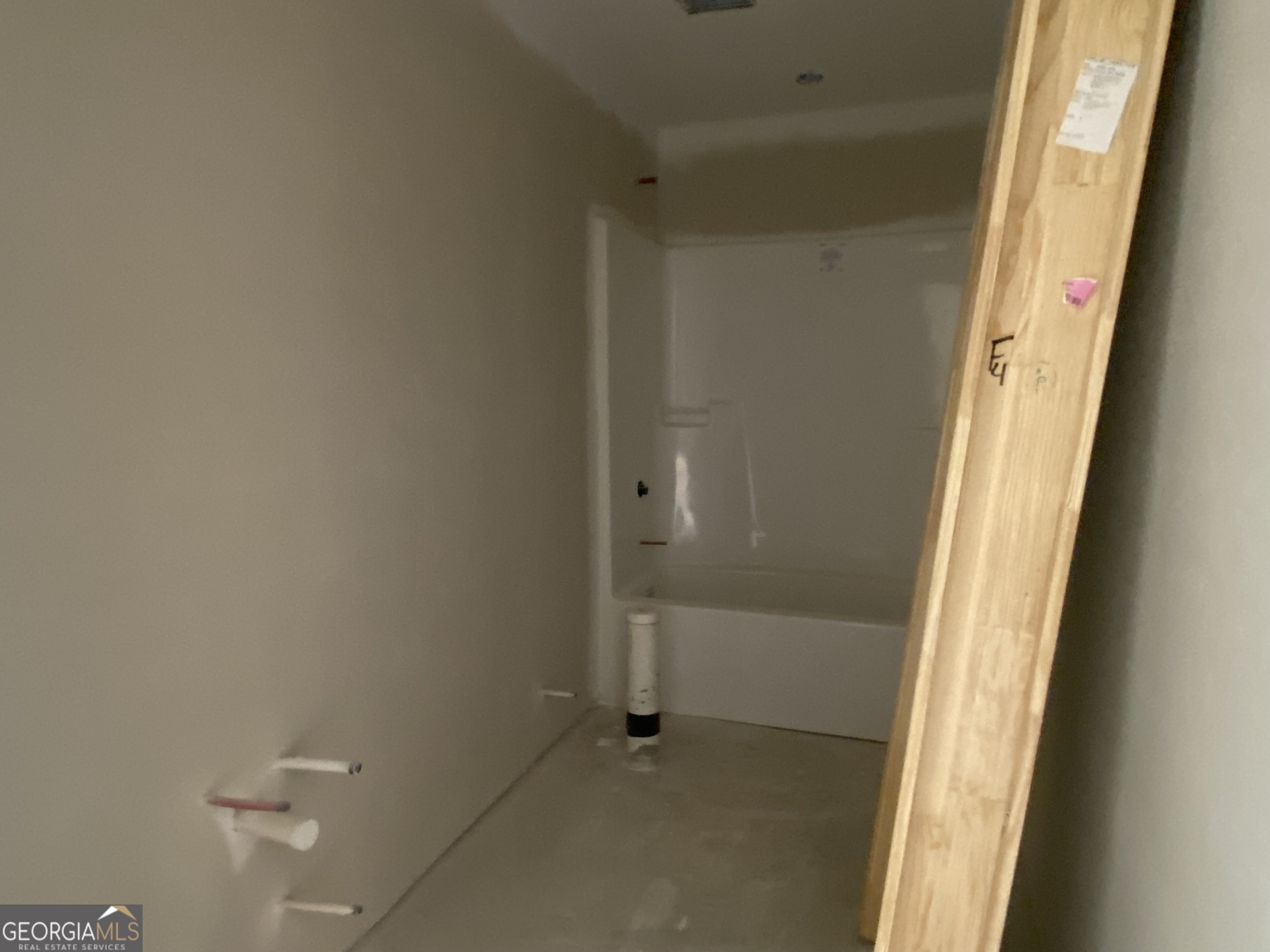 164 Mathews Road Milner, GA 30257 - Photo 12 of 15 a view of an empty walk in closet