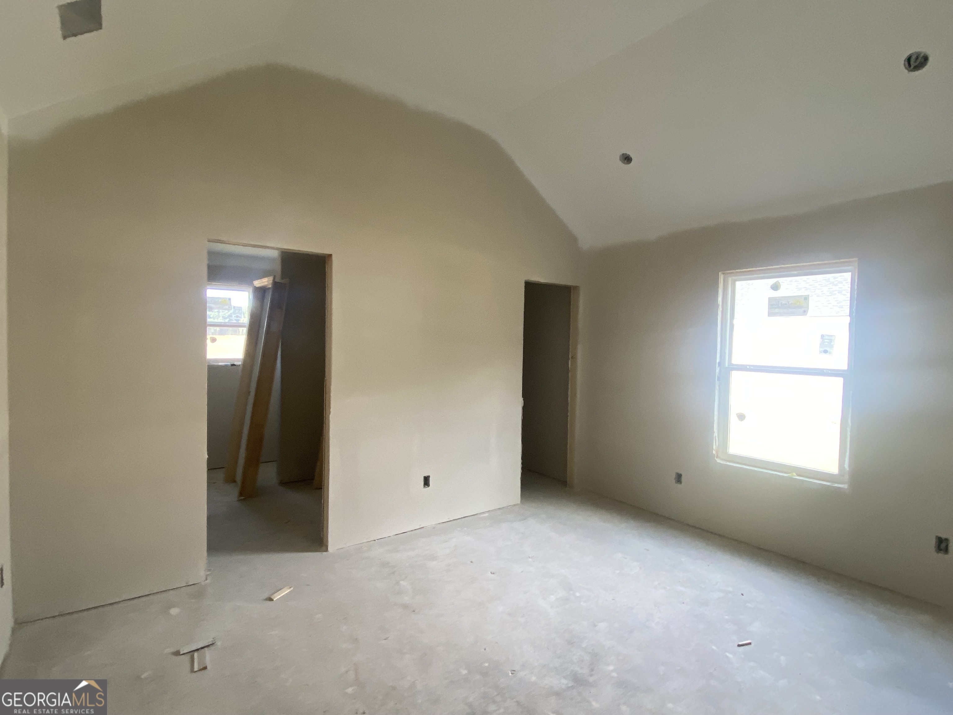 164 Mathews Road Milner, GA 30257 - Photo 8 of 15 an empty room with windows and closet