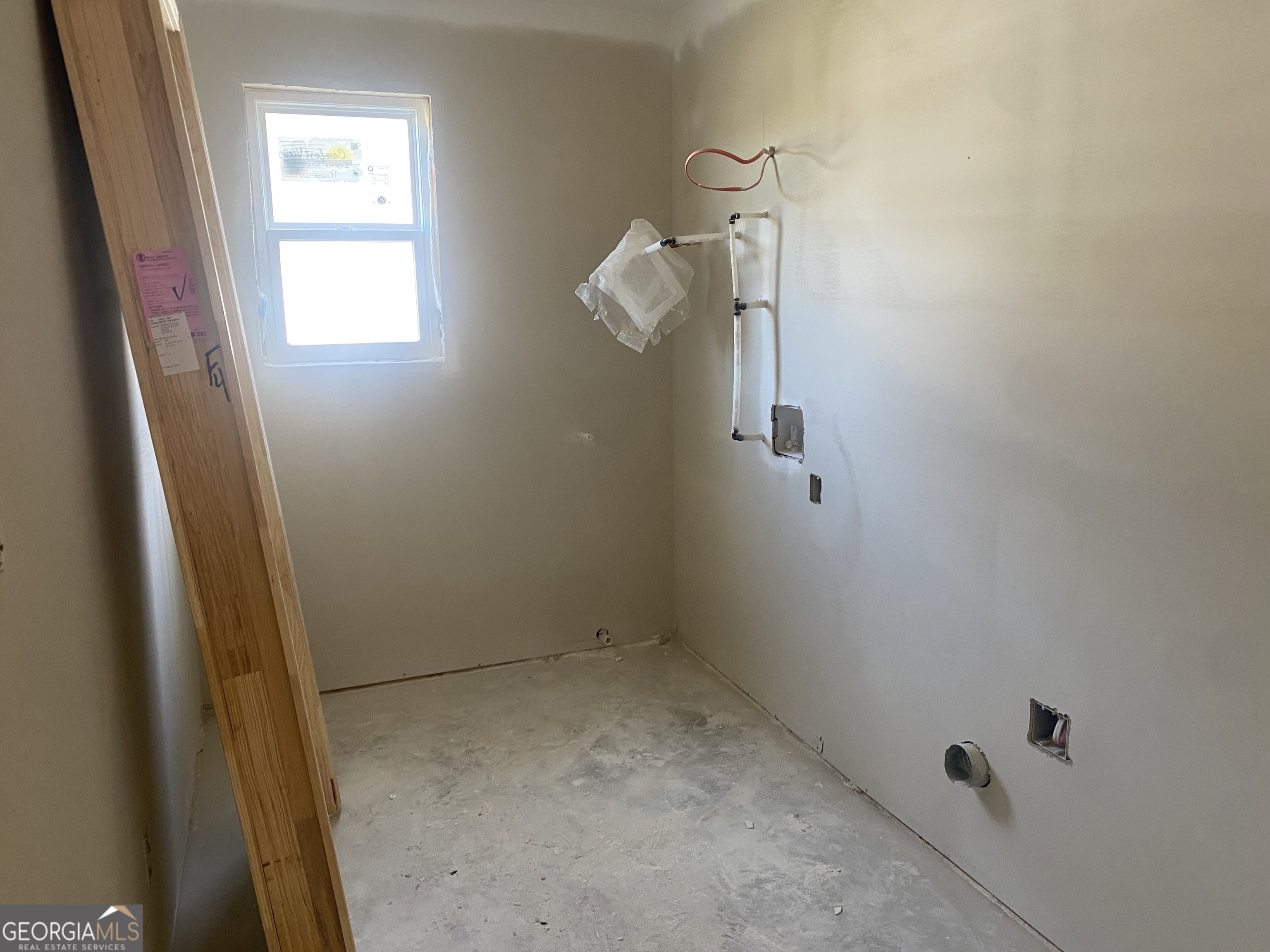 164 Mathews Road Milner, GA 30257 - Photo 9 of 15 a view of small space with racks on the wall