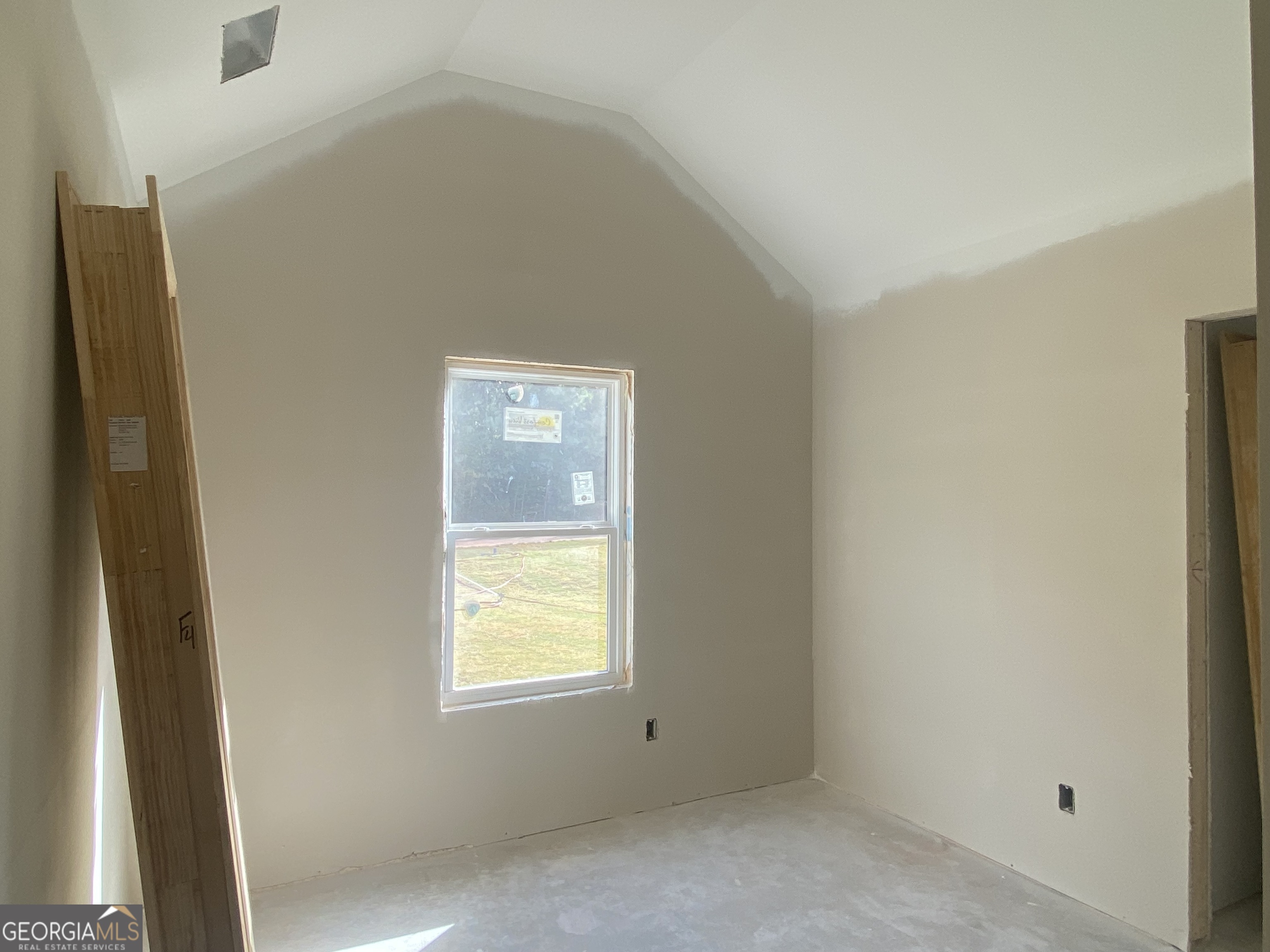 164 Mathews Road Milner, GA 30257 - Photo 10 of 15 a view of an empty room and a window