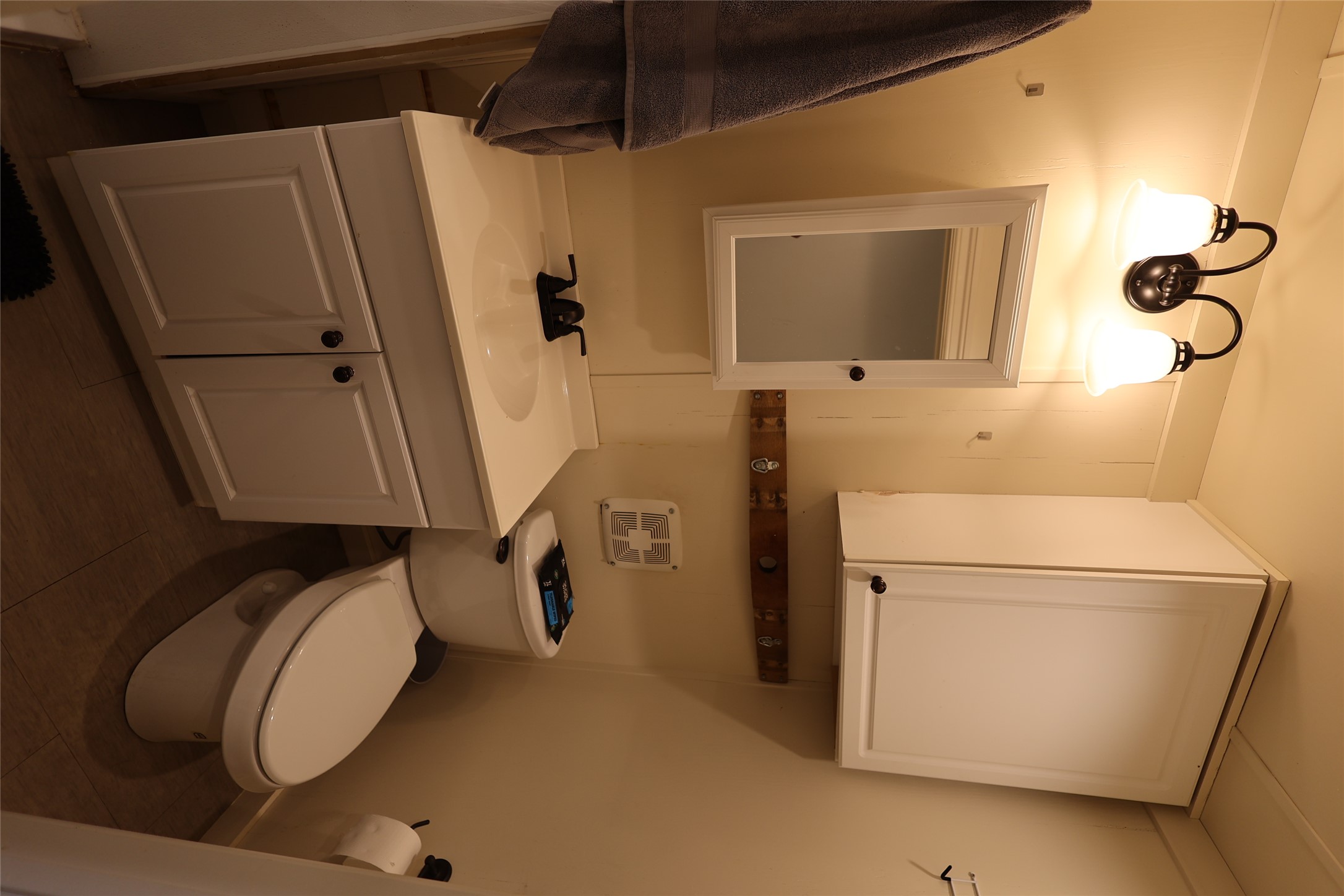 1399 Klett Ranch Road Johnson City, TX 78636 - Photo 5 of 23 a bathroom with a sink a toilet and vanity