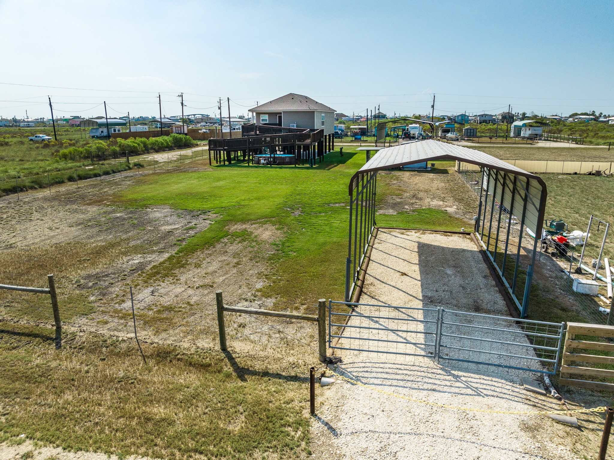172 Curlew Street Sargent, TX 77414 - Photo 24 of 24 a view of a lake with a house