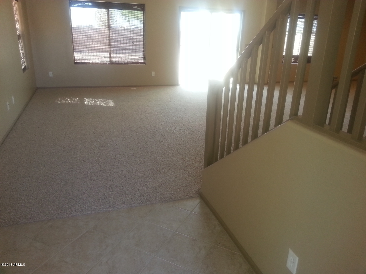 44395 Cypress Lane Maricopa, AZ 85138 - Photo 3 of 20 an empty room with windows