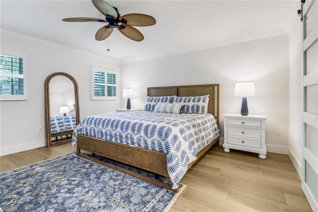 14 Rivard Road, Unit 7 Naples, FL 34112 - Photo 8 of 26 Master bedroom, King bed