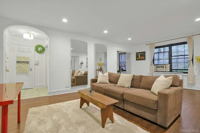 a living room with furniture and a couch