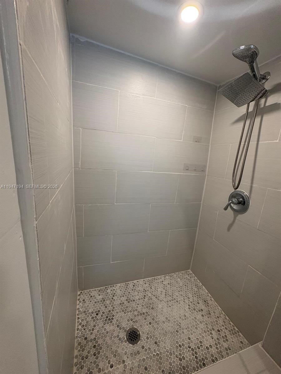 6104 Southwest 33rd Street Miramar, FL 33023 - Photo 12 of 31 a bathroom with a shower