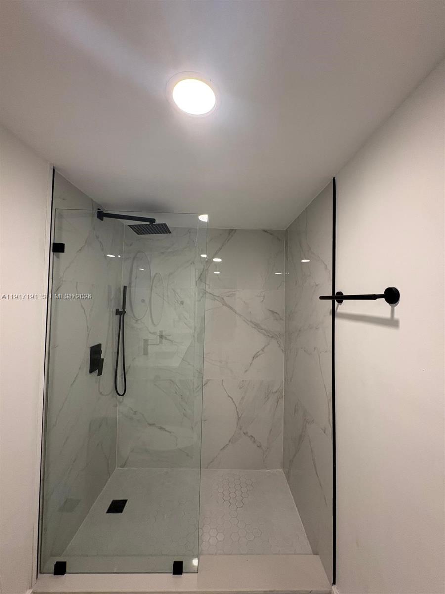 6104 Southwest 33rd Street Miramar, FL 33023 - Photo 19 of 31 a bathroom with a shower