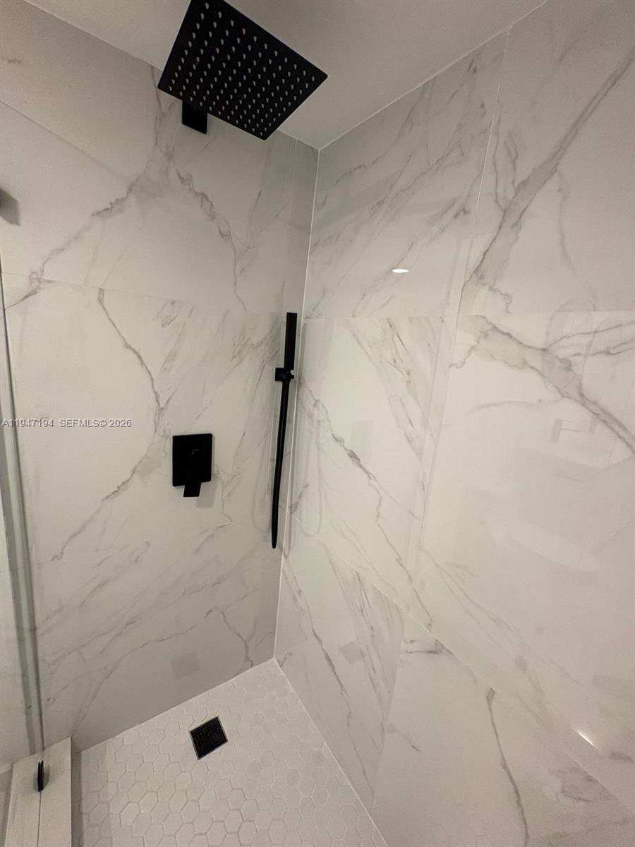 6104 Southwest 33rd Street Miramar, FL 33023 - Photo 20 of 31 a bathroom with a shower