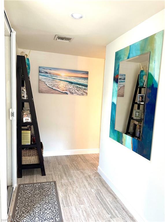 214 Bobolink Way, Unit 214B Naples, FL 34105 - Photo 7 of 15 View of corridor