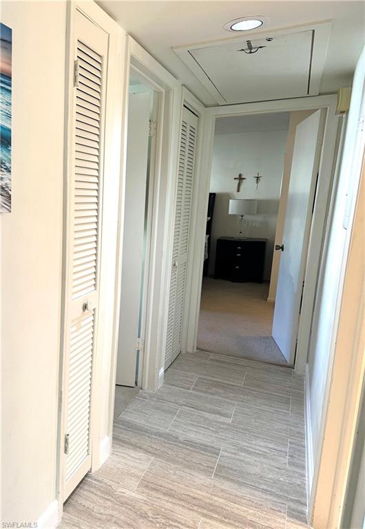 214 Bobolink Way, Unit 214B Naples, FL 34105 - Photo 8 of 15 View of hallway
