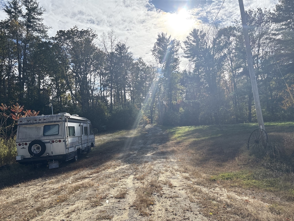 194 Old Greenwich Plain Road Hardwick, MA 01082 - Photo 13 of 13 a view of a house with a yard