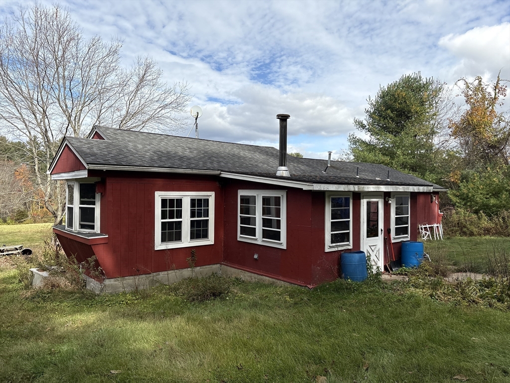 194 Old Greenwich Plain Road Hardwick, MA 01082 - Photo 7 of 13 a view of a house with a yard and large tree
