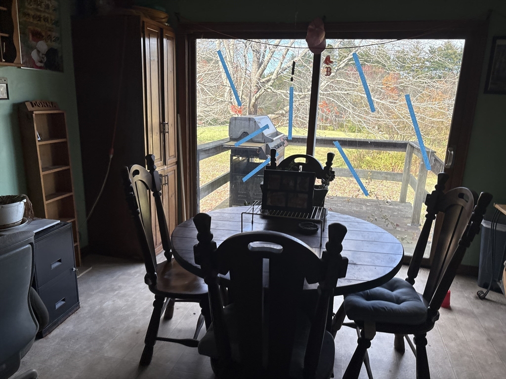 194 Old Greenwich Plain Road Hardwick, MA 01082 - Photo 9 of 13 a view of a workspace with furniture and a window