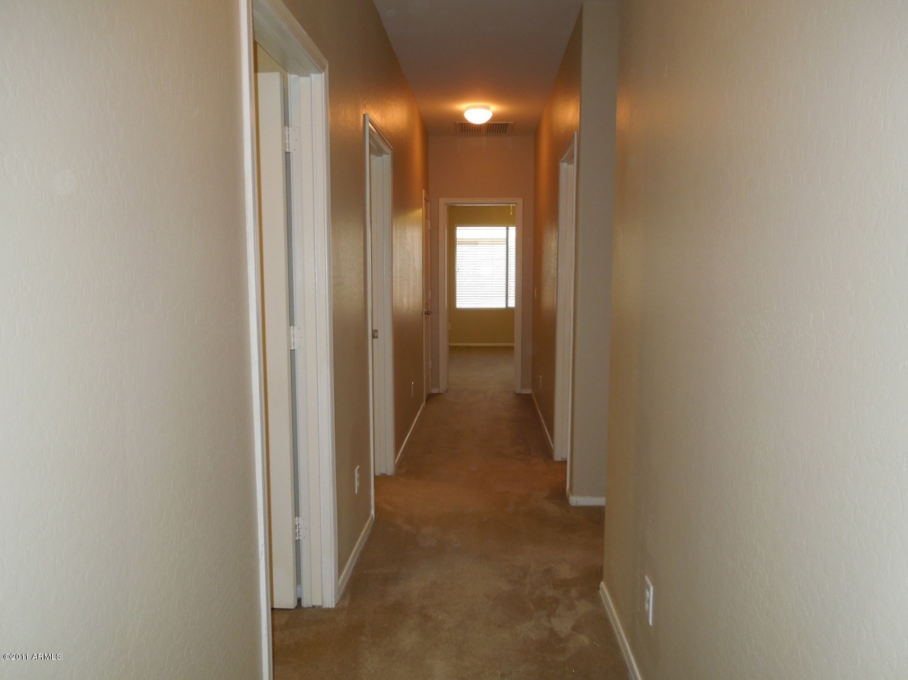 7026 West Beverly Road Laveen, AZ 85339 - Photo 12 of 24 12_CorridorWalkWay