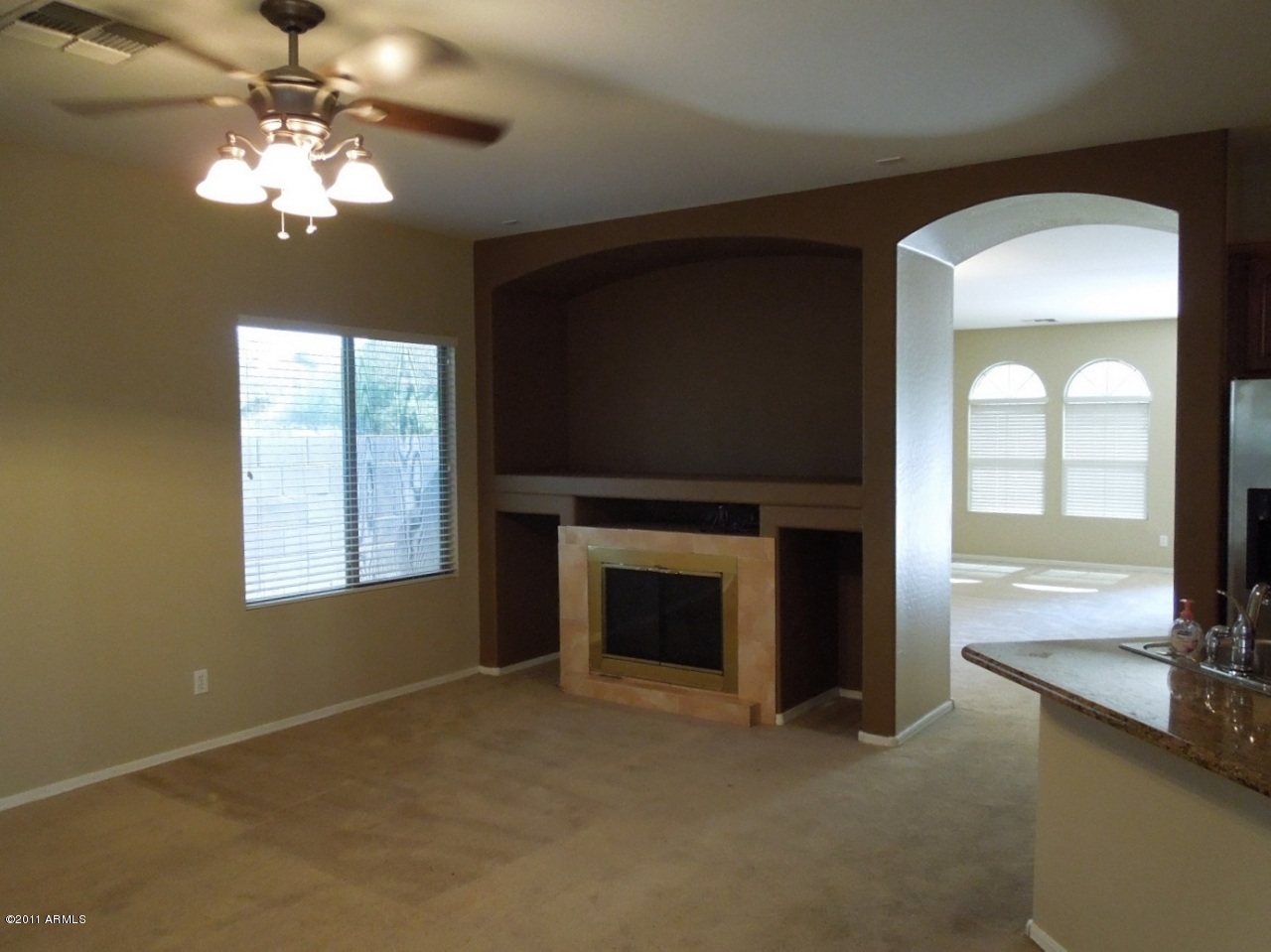 7026 West Beverly Road Laveen, AZ 85339 - Photo 8 of 24 8_FamilyRoomFirePlace