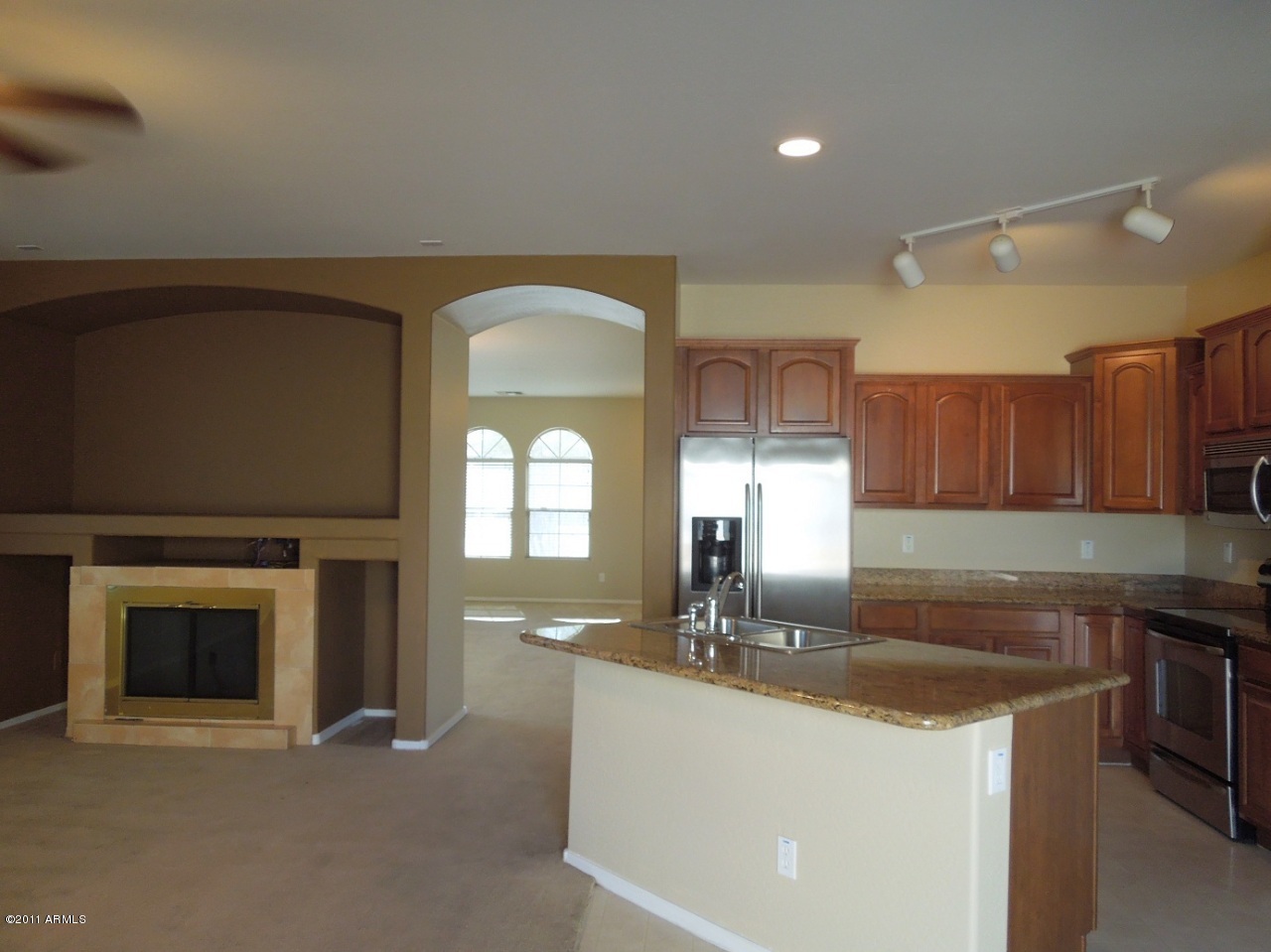 7026 West Beverly Road Laveen, AZ 85339 - Photo 9 of 24 9_KitchenFirePlace
