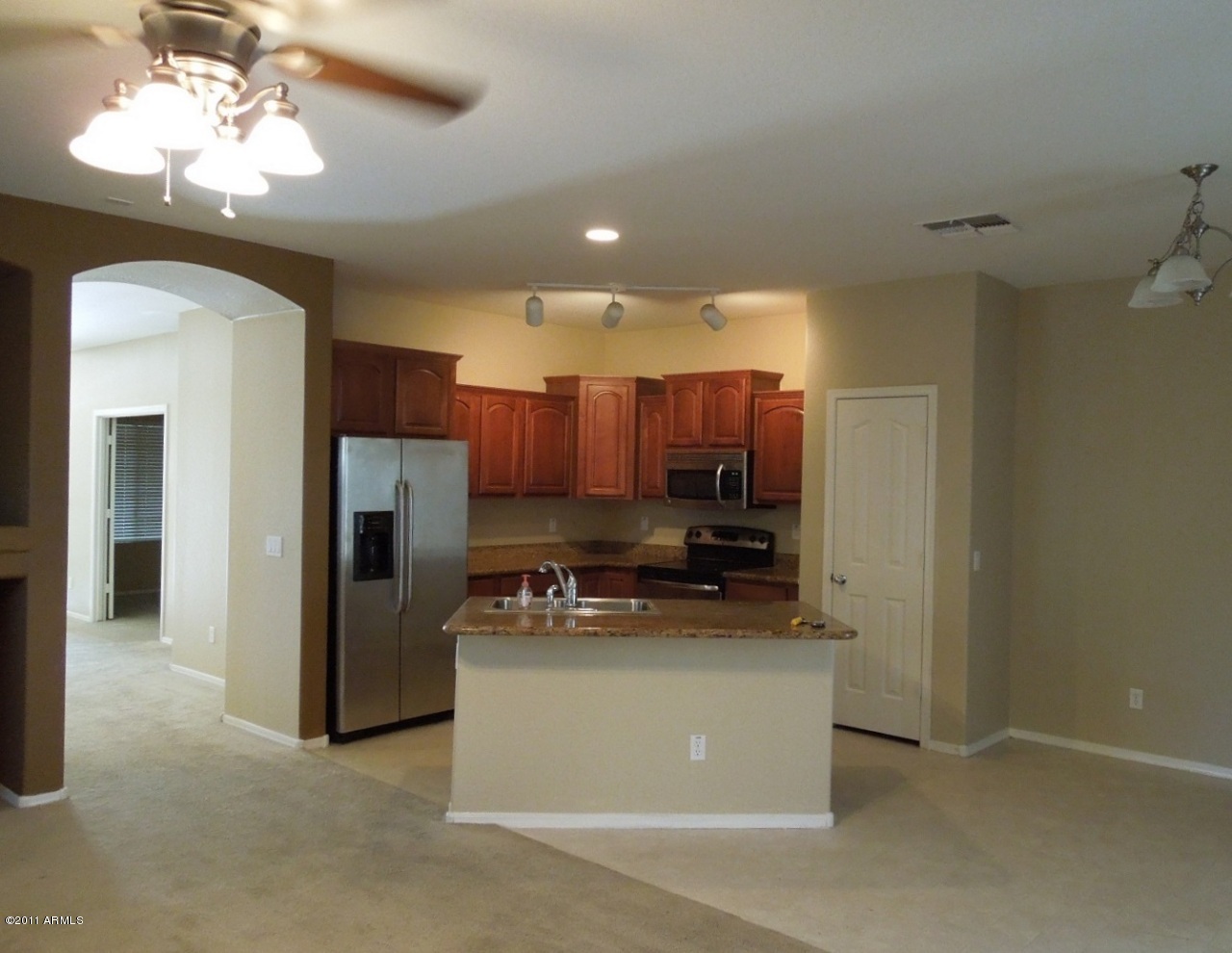 7026 West Beverly Road Laveen, AZ 85339 - Photo 10 of 24 10_KitchenGraniteStainlessAppliance