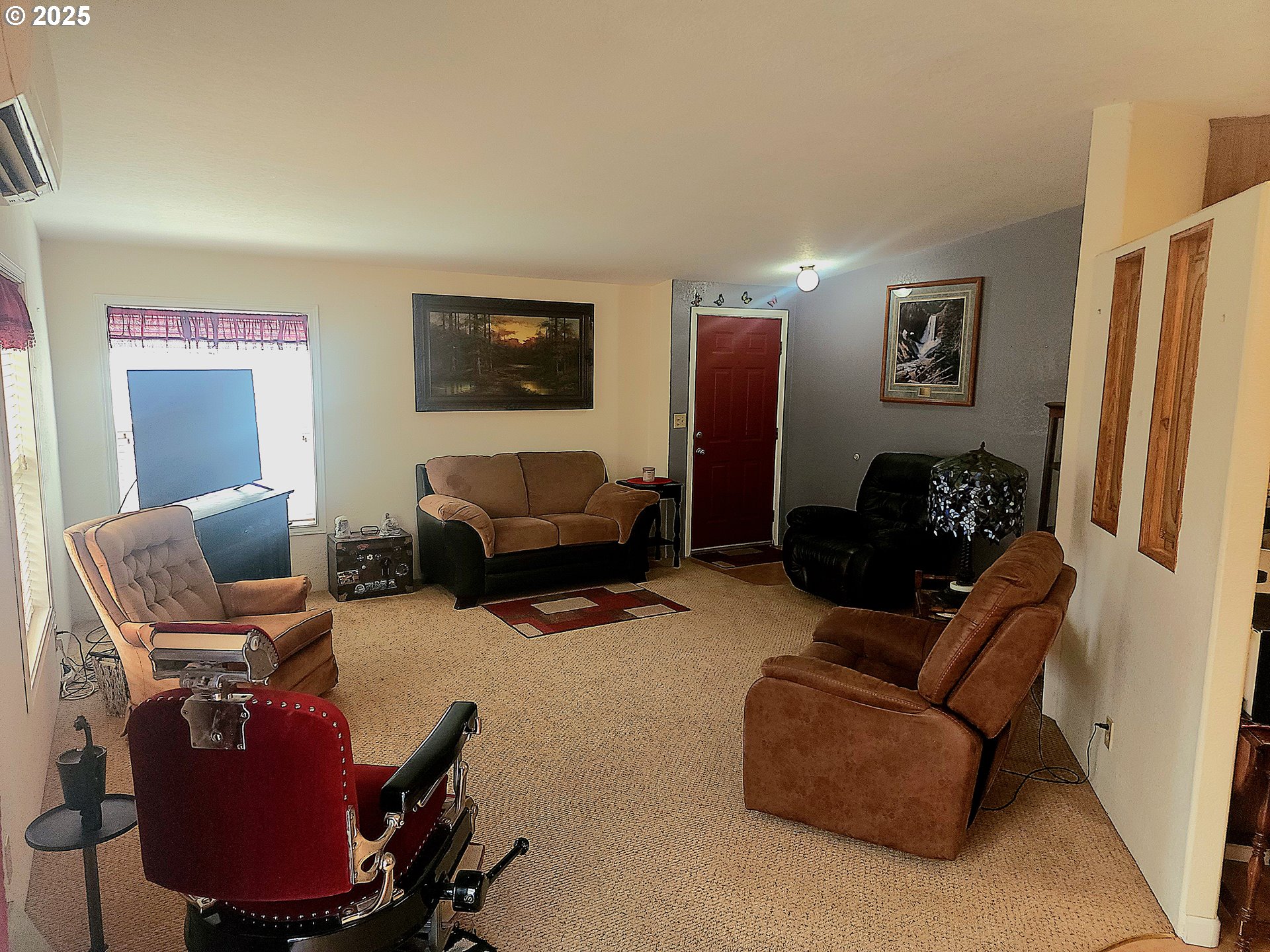 1199 South 58th Street Springfield, OR 97478 - Photo 18 of 30 a living room with furniture and a flat screen tv