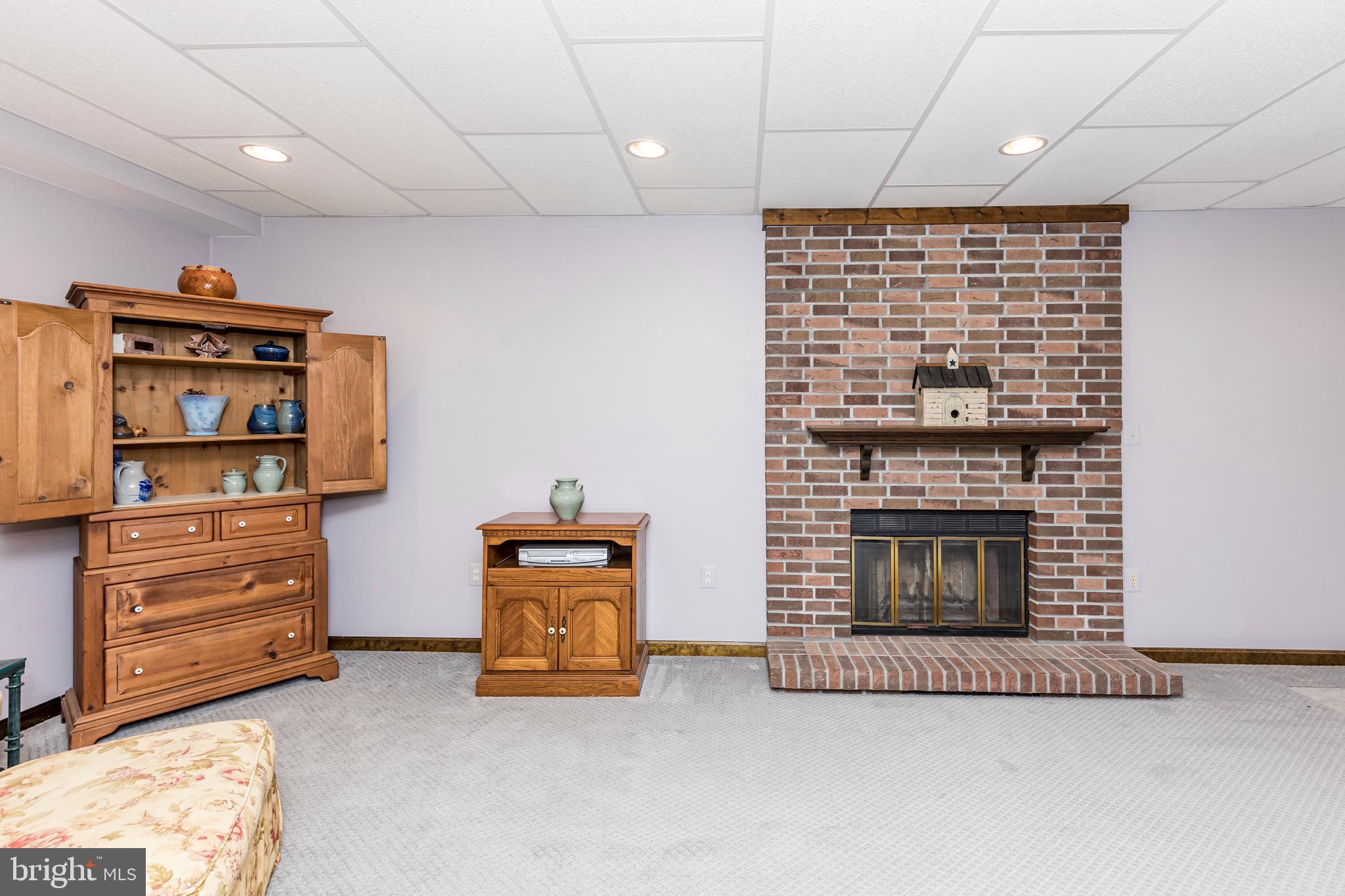 1550 South Rolling Road Baltimore, MD 21227 - Photo 56 of 75 Lower level basement with fireplace