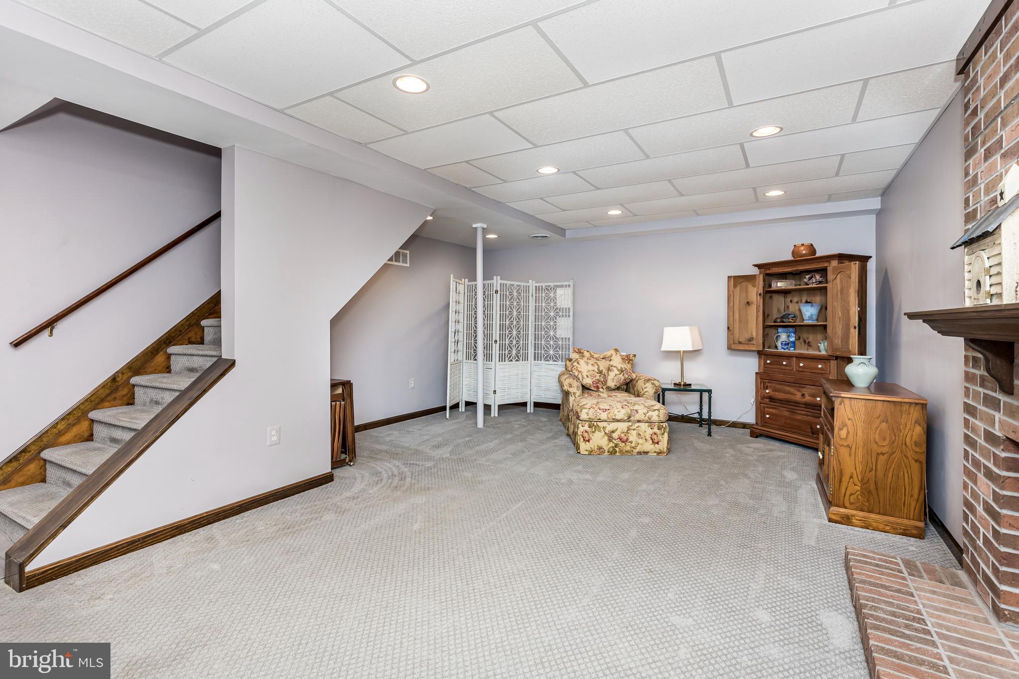 1550 South Rolling Road Baltimore, MD 21227 - Photo 58 of 75 Lower level basement with fireplace