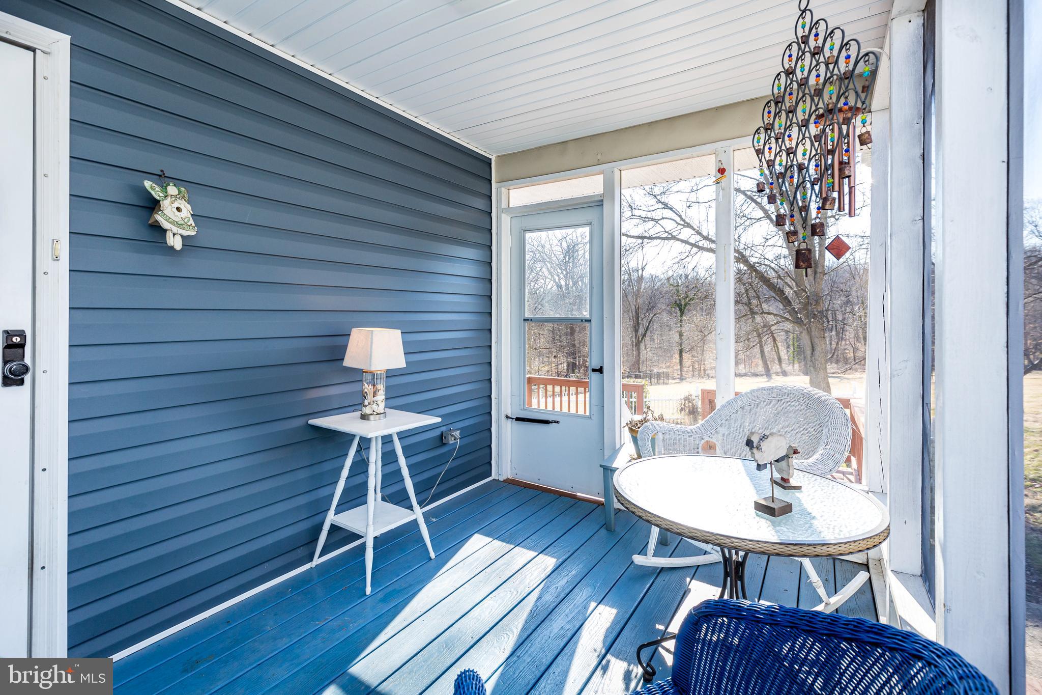 1550 South Rolling Road Baltimore, MD 21227 - Photo 60 of 75 Side enclosed porch
