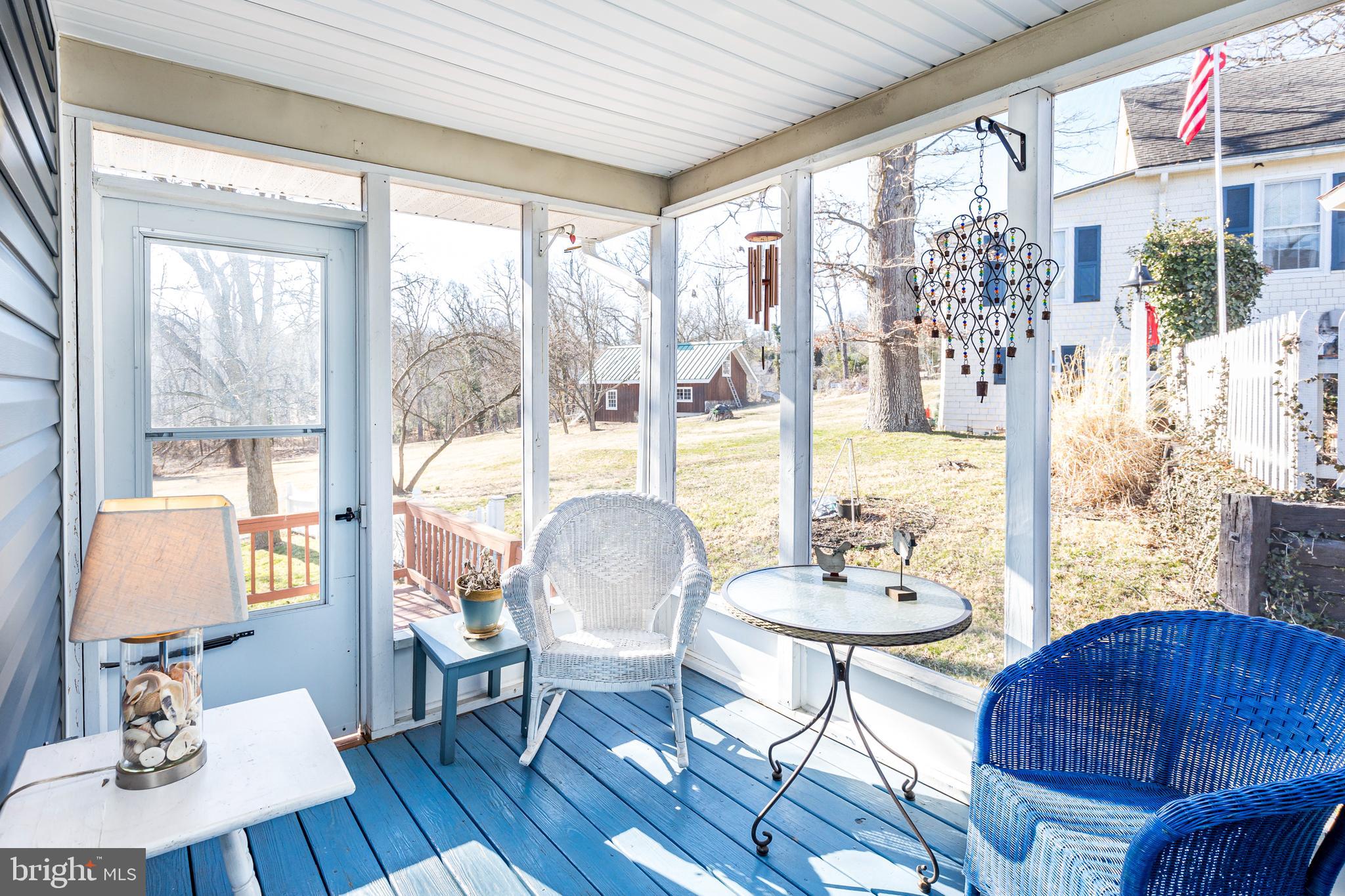 1550 South Rolling Road Baltimore, MD 21227 - Photo 61 of 75 Side enclosed porch