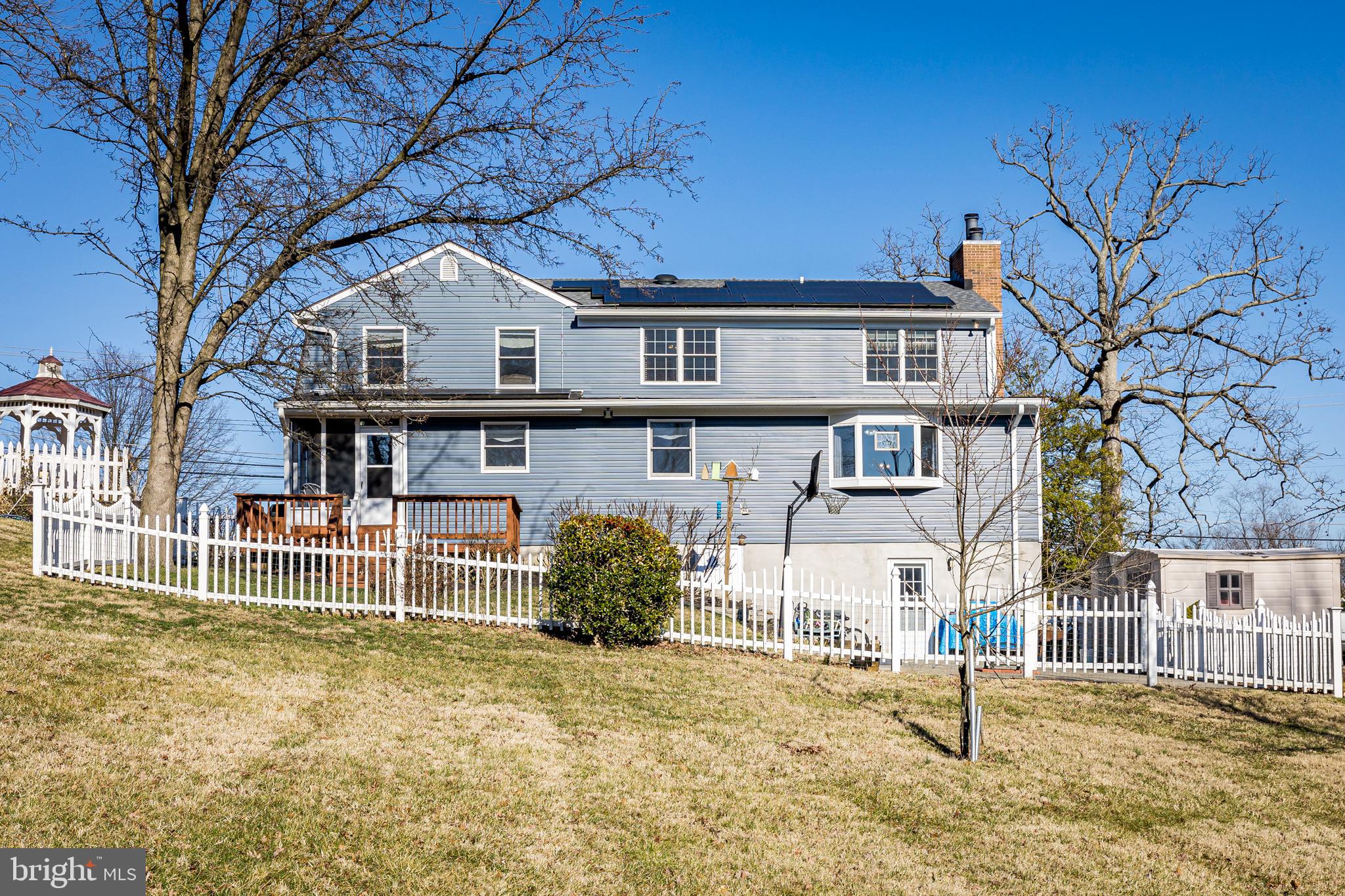 1550 South Rolling Road Baltimore, MD 21227 - Photo 68 of 75 Concrete patio with 2 sheds