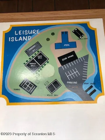 a picture of a book in the view of a back yard of the house