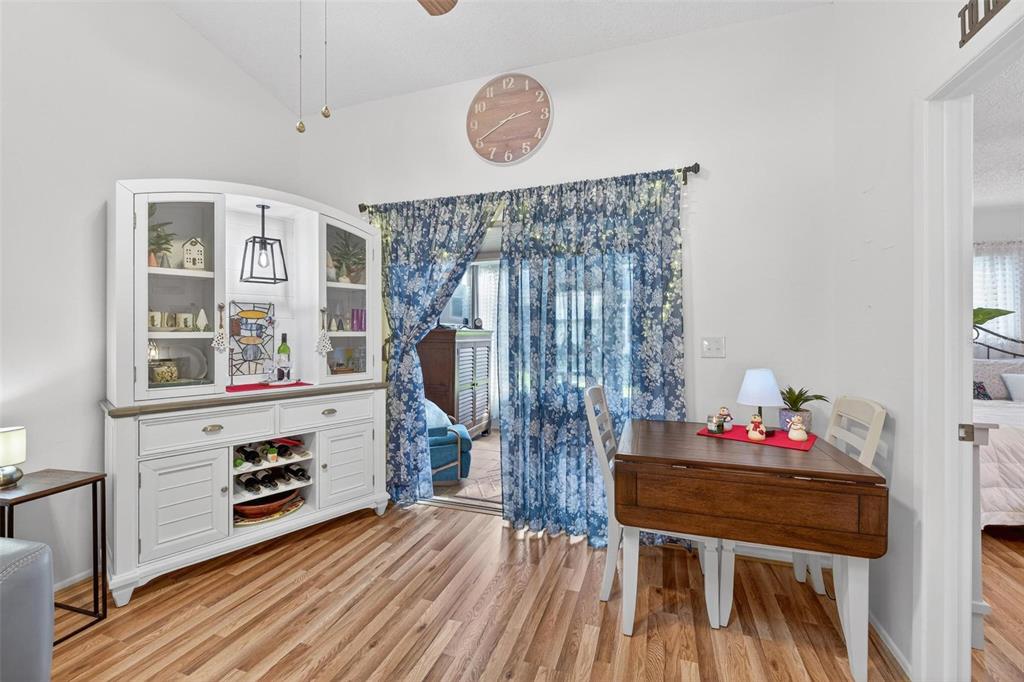6506 Thicket Trail New Port Richey, FL 34653 - Photo 25 of 71 a living room with furniture and a wooden floor