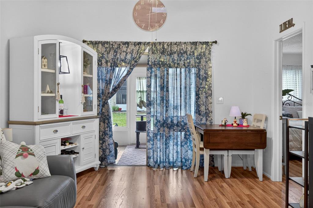 6506 Thicket Trail New Port Richey, FL 34653 - Photo 26 of 71 a living room with furniture and a wooden floor