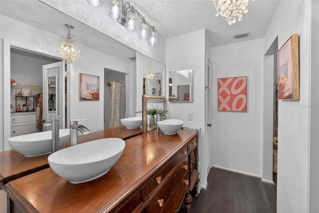 6506 Thicket Trail New Port Richey, FL 34653 - Photo 46 of 71 a room with stainless steel appliances a dining table and chairs