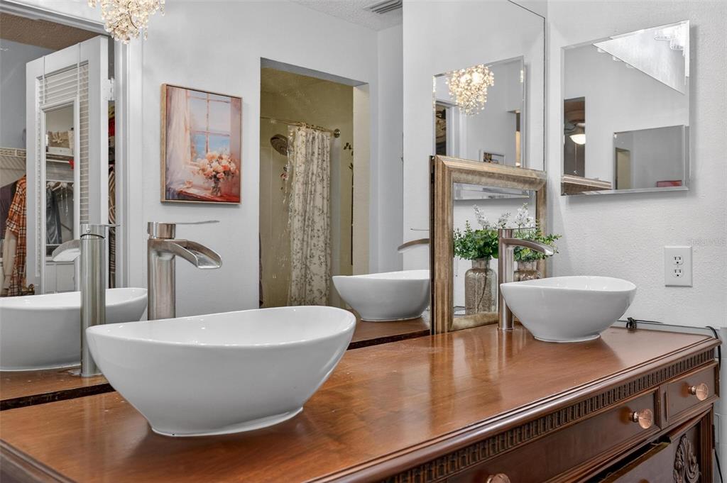 6506 Thicket Trail New Port Richey, FL 34653 - Photo 49 of 71 a room with table chair and potted plant