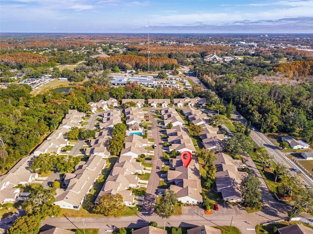 6506 Thicket Trail New Port Richey, FL 34653 - Photo 60 of 71 an aerial view of residential houses with outdoor space