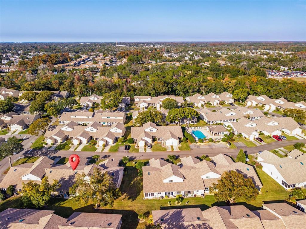 6506 Thicket Trail New Port Richey, FL 34653 - Photo 63 of 71 an aerial view of residential houses with outdoor space