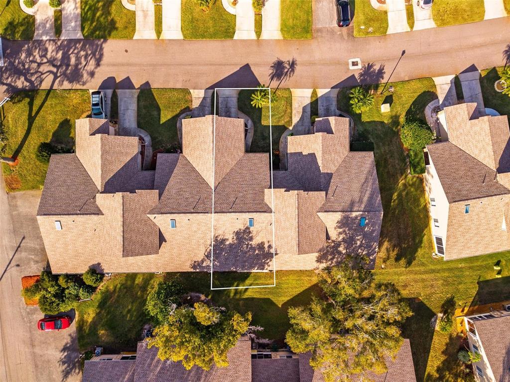 6506 Thicket Trail New Port Richey, FL 34653 - Photo 64 of 71 an aerial view of residential houses with outdoor space