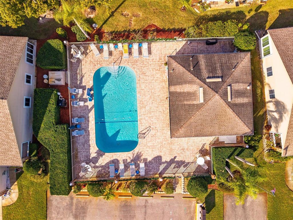 6506 Thicket Trail New Port Richey, FL 34653 - Photo 68 of 71 an aerial view of a house with a yard and outdoor seating