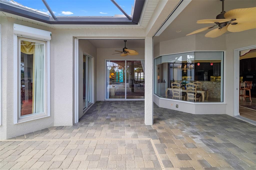 1016 Scherer Way Osprey, FL 34229 - Photo 56 of 76 a view of livingroom with hardwood floor and a ceiling fan