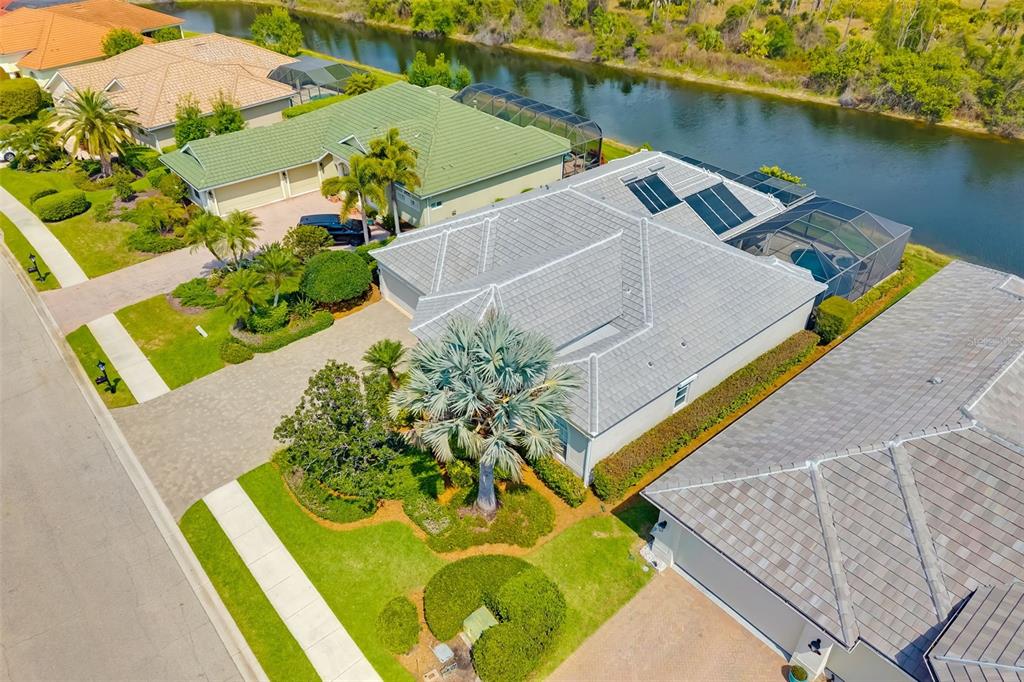 1016 Scherer Way Osprey, FL 34229 - Photo 6 of 76 an aerial view of a house with a swimming pool